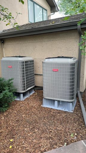 Dual Bryant HVAC heat pump units qualifying for federal heat pump tax credits and rebates in Colorado.